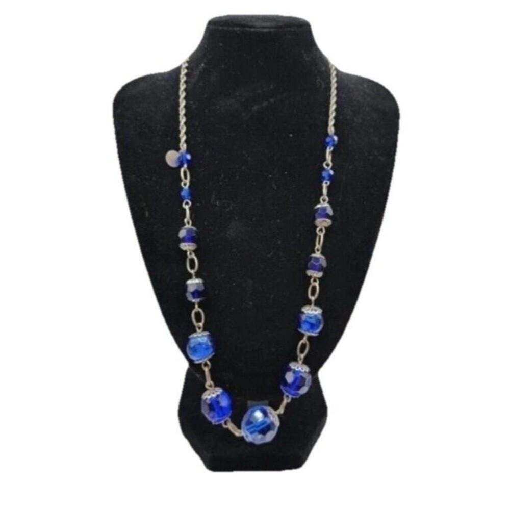 vintage-style necklace features blue faceted glass beads accented silver tone 20